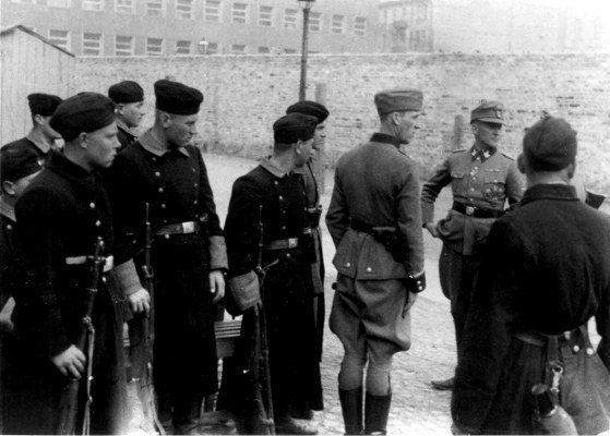 Askaris assigned to fighting the Jewish resistance note, Stroop in the Facing the camera